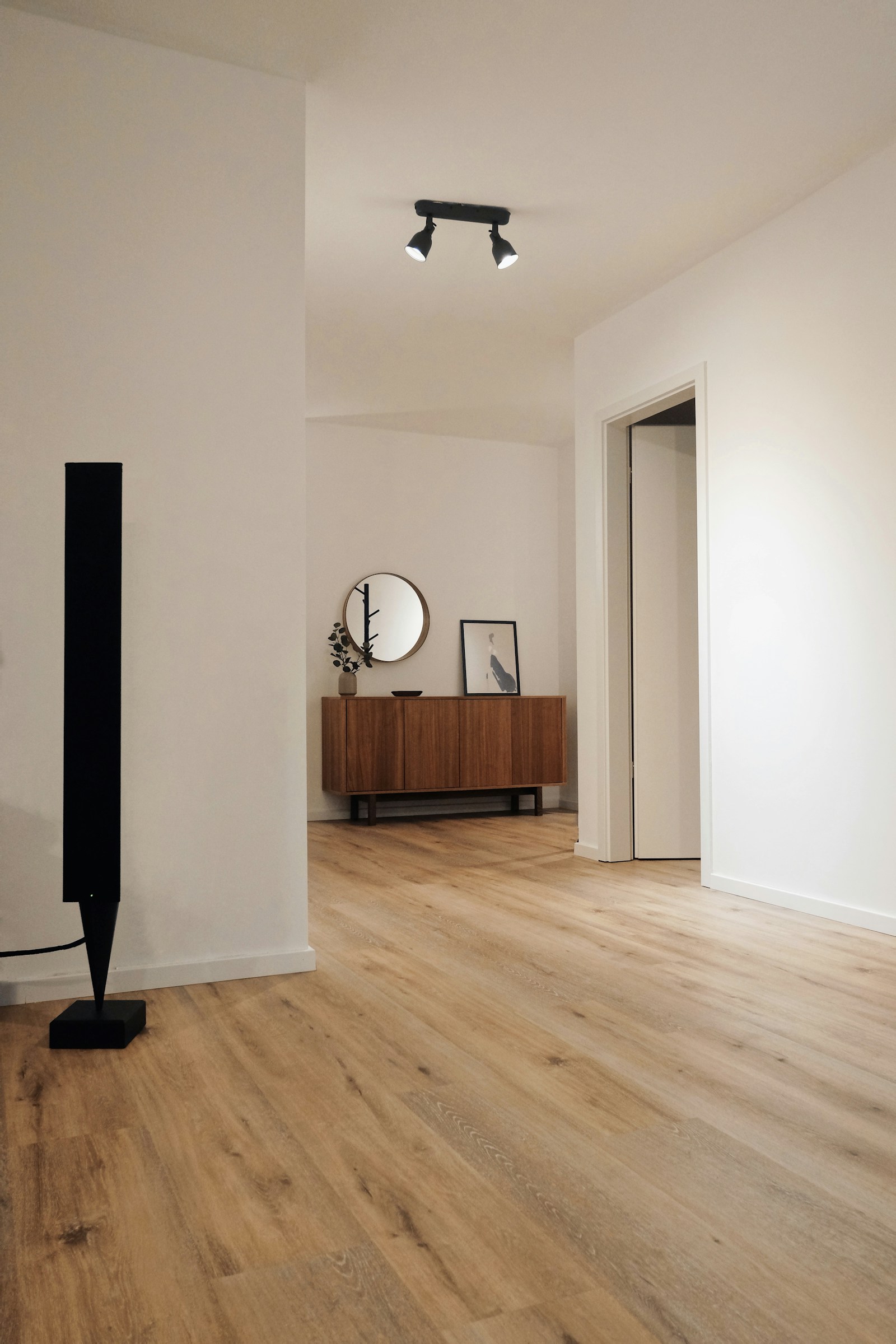 A floorstanding speaker in a hallway — stock photograph